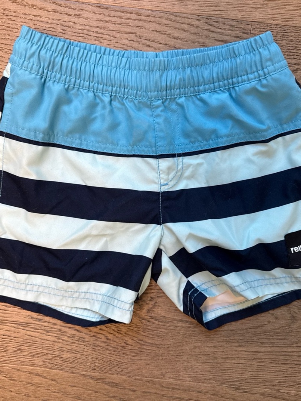 Boys Light Blue and Navy Striped Swim Trunks